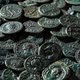 Illustration for article titled Farmer Discovers Priceless Trove of Ancient Roman Coins While Removing a Molehill